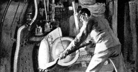 A man shovels coal into a locomotive steam engine while the engineer drives.