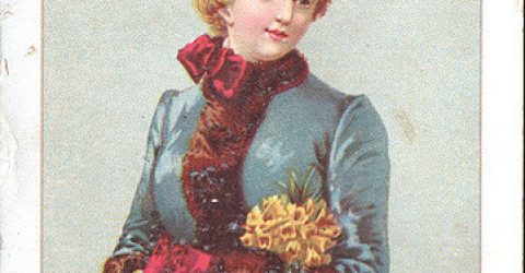 A Victorian era wearing a feathered hat woman poses with clutch and flowers.