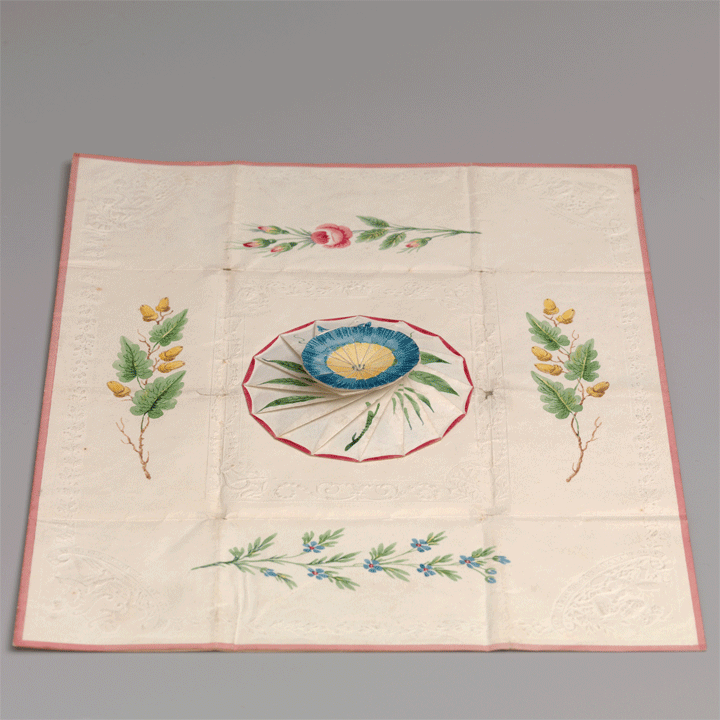 Elaborately embossed paper by Dobbs. Borders are embossed with Cherubs and French phrases. The borders have laurel at top and bottom, and oak leaves on both sides.