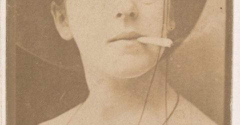 Actress with monocle and cigarette, from the Actresses series (N664) promoting Old Fashion Fine Cut Tobacco
